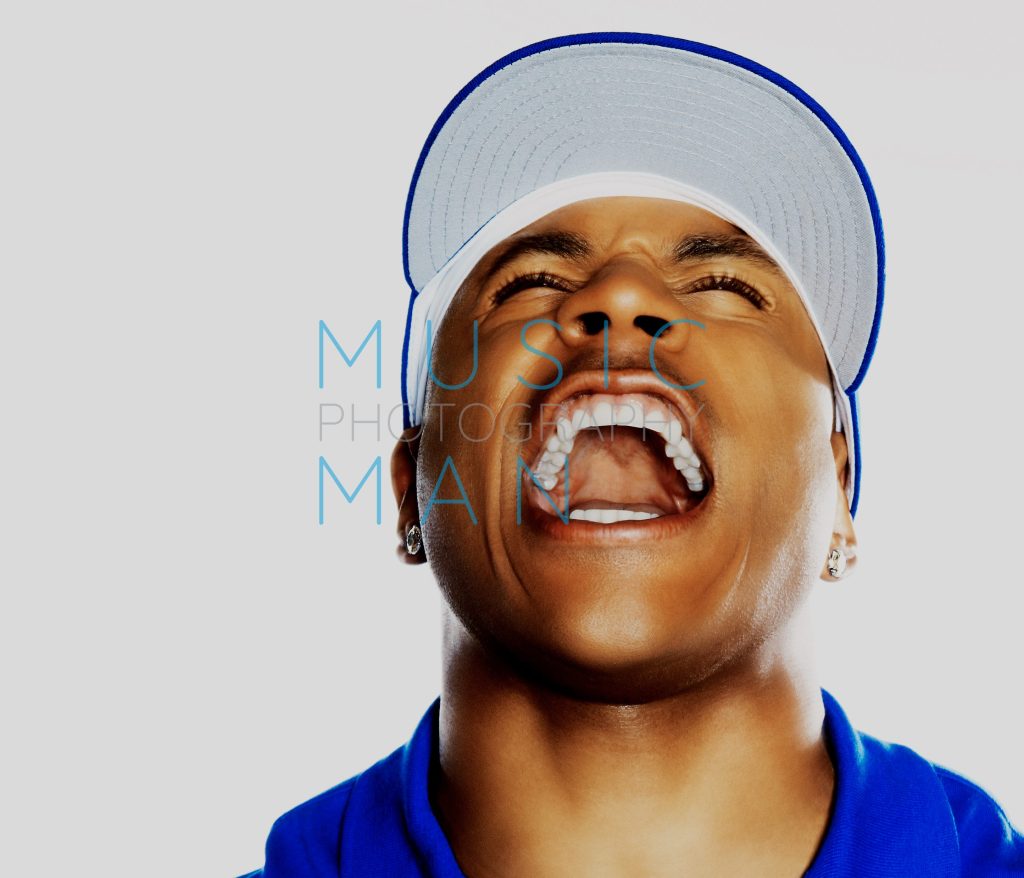 Hip-hop icon LL Cool J shouting with head tilted back during a high-energy studio portrait session in London, photography by Music Man Studio.